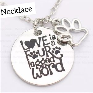 Necklace that says “Love is a Four Legged Word”